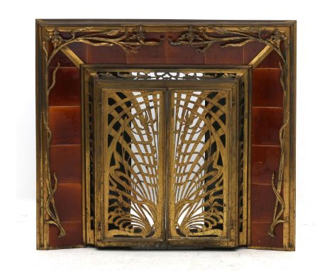 Art Nouveau A fireplace-front, openworked brass with brown glazed ceramic tiles, decorated with wavy floral pattern, circa 19