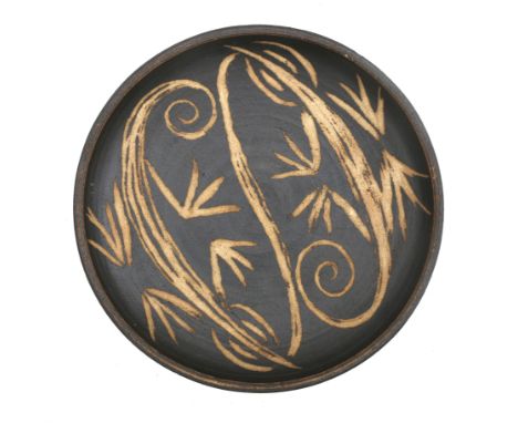 Jan van Stolk (1920-1997) A ceramic wall plate with incised pattern of two salamanders on a black ground, mongrammed VS to th