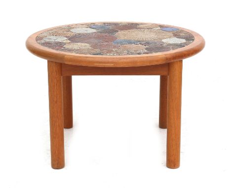 Tue Poulsen (1939) An oak coffee table, the top inlaid with a mosaic of circular glazed ceramic tiles, produced by Haslev Møb