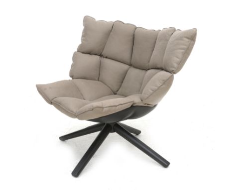 Patricia Urquiola (1961) An easy chair with grey upholstered cushion, on black base, model Husk, produced by B&amp;B Italia, 