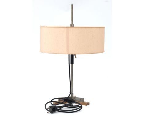 Midcentury Modern An adjustable table lamp, partly black lacquered metal with fabric shade, on tripod base with teak, in the 