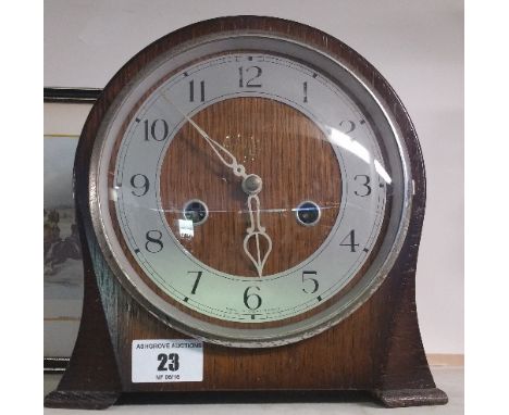 A 20th Century Oak Mantel Clock.`