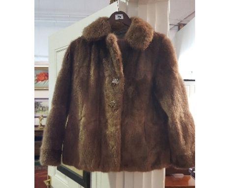A Good Quality Vintage Fur Jacket, fully lined and with Switzers of Dublin label.