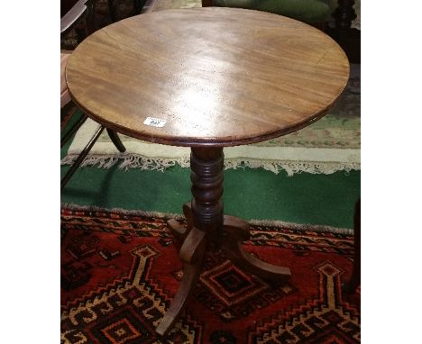 A Lovely Early 19th Century Wine Table, on a turned support and a tripod base.