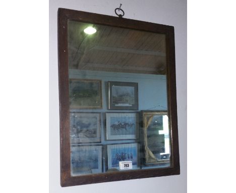 A Small Oak Framed Wall Mirror.