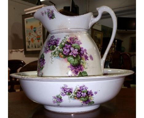 A Staffordshire Wash Jug & Basin decorated with trailing pansies and trailing flowers.