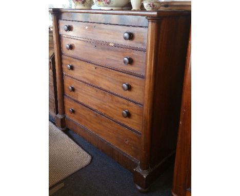 An Early 19th Century Mahogany Scotch Chest of Drawers; with five graduated drawers.