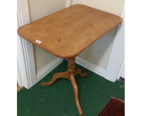 A Victorian Rectangular Snap Top Wine Table; with a turned pillar and tripod base.