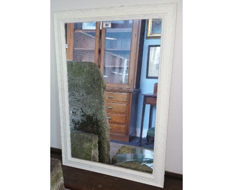 A Modern Wall Mirror, having a cream painted frame.