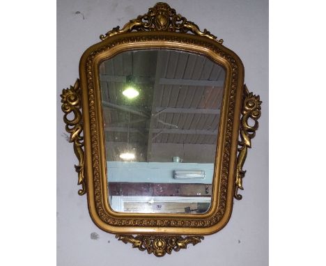 A 20th Century Plaster Gilt Wall Mirror with Egg and Dart Moulding.