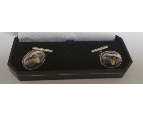 A Pair of Silver Enamel Duck Cufflinks.