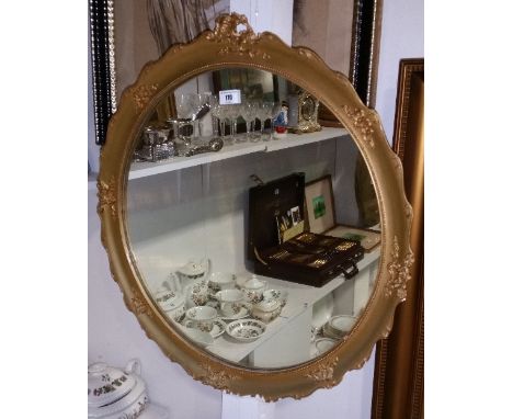 A Gilt Circular Framed Mirror, 63.5cm (h) x 62cm (w).