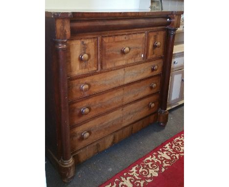 A 19th Century Mahogany Scotch Chest of Drawers, with frieze drawer over a further three short drawers and three long drawers