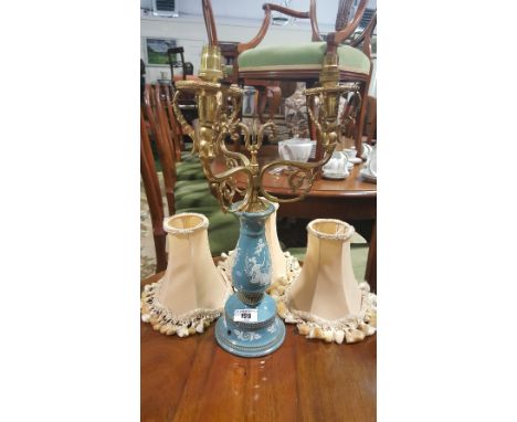 An Italian Terracotta and Ormolu Three Branch Light; with classically painted white and turquoise shaft.
