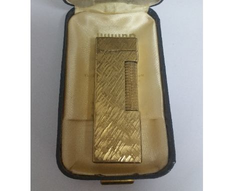 A Dunhill Lighter in Original Box.