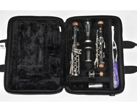 A YAMAHA CLARINET WITH HARD MATERIAL CASE, marked 255 on the body and serial no. L03396, housed within a black, plush lined c