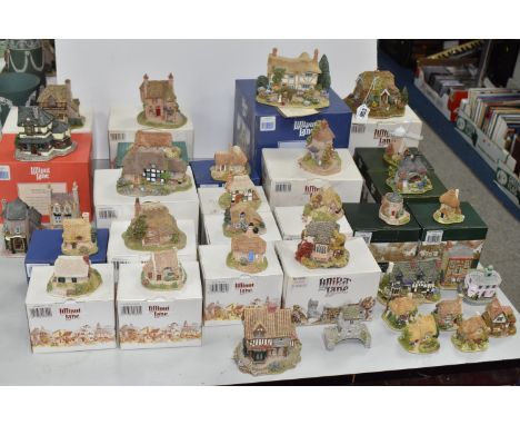 A GROUP OF THIRTY-FOUR LILLIPUT LANE SCULPTURES, comprising Village Shops collection, 'Jones the Butcher' L649, (small chip o