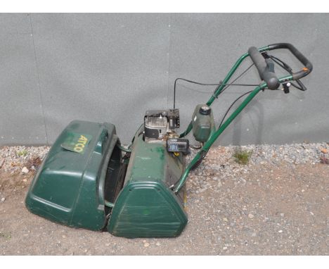 AN ATCO BALMORAL 20s PETROL CYLINDER MOWER, with grass box (engine pulls freely but hasn't started)