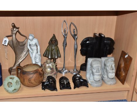 A COLLECTION OF MISCELLANEOUS ITEMS, to include a French spelter figure of a child in a raincoat, a carved stone Budda figure