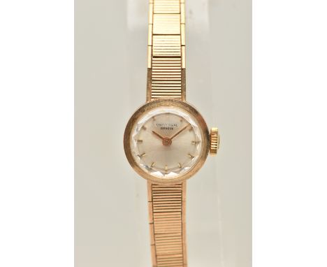 A 9CT GOLD 'UNIVERSAL' LADIES WRISTWATCH, hand wound movement, round dial signed 'Universal', baton markers, yellow gold case