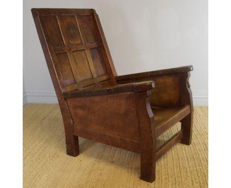 A Robert 'Mouseman' Thompson (Kilburn North Yorkshire) oak smokers armchair, with carved signature c1930-1955, 94.5cm high Sp