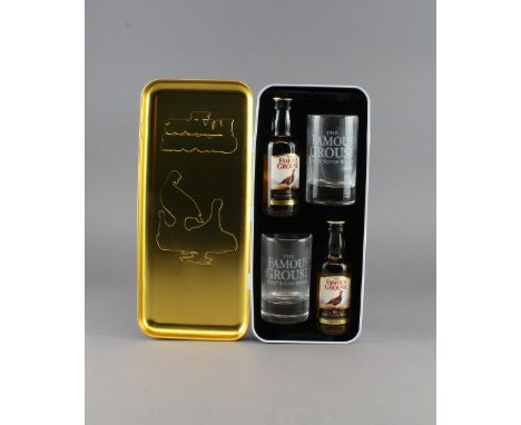 A Famous Grouse gift tin, containing two 5cl bottles of The Famous Grouse Scotch Whisky and two glasses Unopened seal, condit
