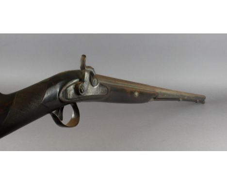 An early 19th Century muzzle loading percussion cap sporting gun by Dunderdale, Mabson & Labron, with steel mounted mahogany 