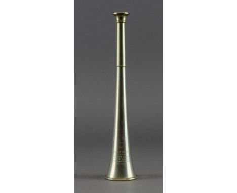 A nickel fox hunting horn by Kohler & Son, 167 Ebury Street, London, 22.5cm long Light surface wear