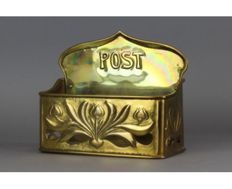 A Keswick School of Industrial Arts brass post box, embossed and pierced with flowers, 23cm wide x 10cm deep x 19cm high Ligh