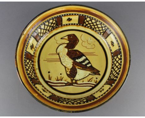 An unusual Poole Pottery slipware bowl, with goose design, reportedly potted by Phoebe Stabler, factory mark No 15 (1922-34),
