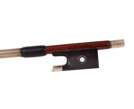 Silver mounted violin bow stamped Roger Lotte, the stick round, the ebony frog inlaid with silver rings enclosing pearl eyes 