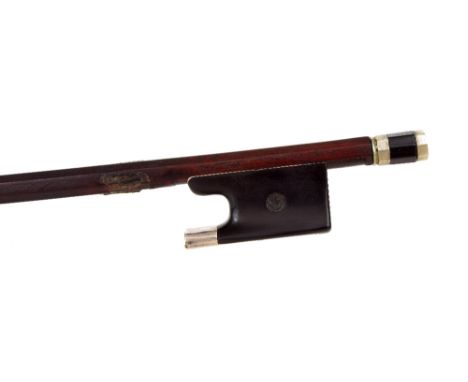 Interesting violin bow stamped Maline, the stick round, the ebony frog inlaid with pearl eyes and with a silver ferrule, the 