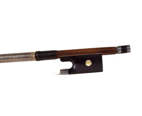 French silver mounted violin bow stamped Emile Ouchard, the stick round, the ebony frog inlaid with pearl eyes and the ebony 