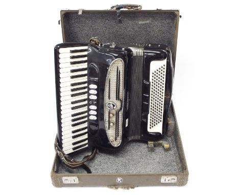 Giulietti 'Handcraft' 120 button piano accordion, with 7 switches, black finish, cased