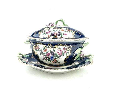 A Worcester blue scale porcelain sauce tureen, cover and stand, circa 1770, with floral painted decoration and twig and flora