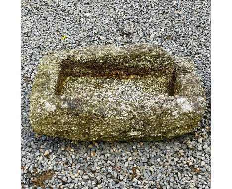 A rectangular granite trough, height 22cm width 64cm depth 43cm .