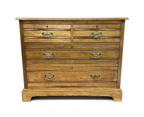 An Edwardian walnut chest of two short and two long drawers, on bracket feet, formerly a dressing chest, height 86cm, width 1