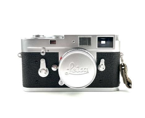 A Leica Rangefinder M2 serial number 1051773 with a Ernst Leitz GmbH Wetzlar Elmar f=5cm 1:2:8 lens Nr 1600453.The roll on an