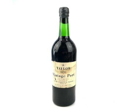 A bottle of Taylor 1970 vintage port bottled 1972 Shipped by Taylor Fladgate &amp; Yeatman Oporto.