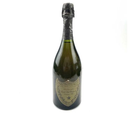 A bottle of Moet Chandon Cuvee Dom Perigion 1980 vintage champagne.