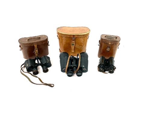 A pair of Ross military binoculars, with broad arrow mark and also stamped 'J.P.Heywood Lonsdale Boodles Club', leather case,