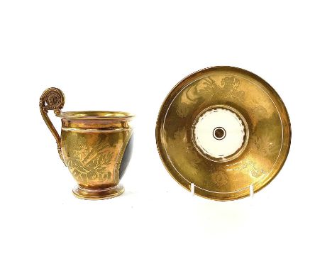 A French Paris porcelain gilt portrait cup and saucer, circa 1830, decorated in the Feuillet workshop with a portrait of a ge