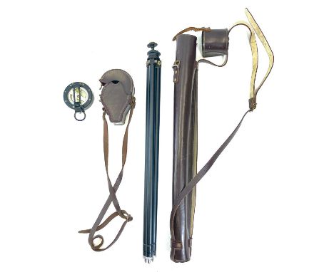 A Surveyor's prismatic compass, diameter 8cm, together with a folding tripod, leather cased.