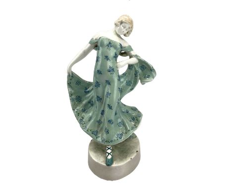 An Art Deco Goldscheider figure of a lady, early 1920s, signed Lindner, printed and impressed marks, height 32.5cm.The leadin