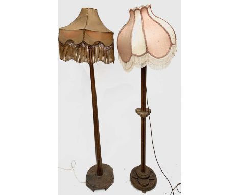 An Art Deco oak standard lamp, by Judith Hughes, monogrammed to the base, height 181cm and another Art Deco standard lamp (2)