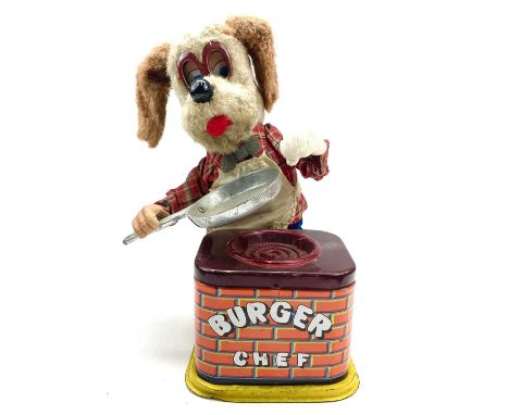 A Japanese tinplate, fabric and plastic automaton toy titled 'Burger Chef', battery operated, height 21cm.