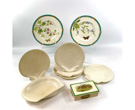 A pair of Victorian porcelain dessert plates, each painted with a flower and a butterfly within gilt and turquoise borders, d