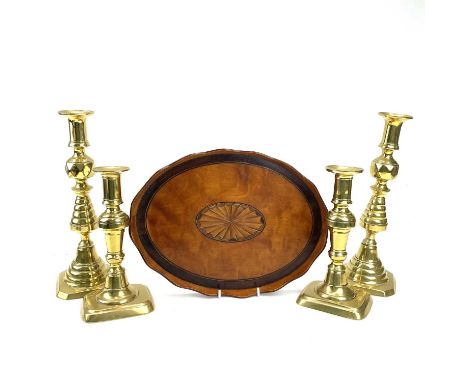 A George III style satinwood and mahogany banded small oval tea tray, with central fan inlay, width 30cm, together with two p