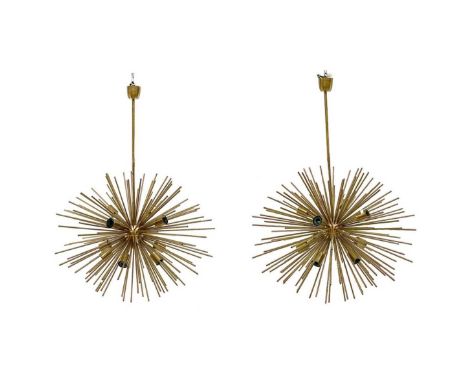 A pair of modern retro style light fittings, each with numerous spikes and fitted ten light branches, diameter 89cm.