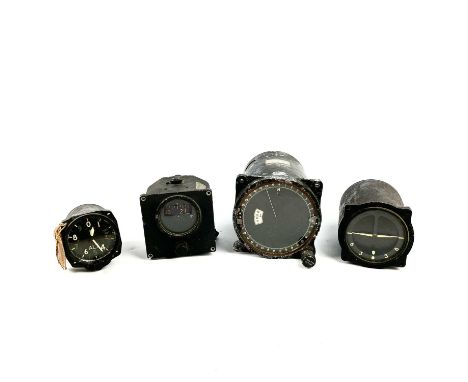 A WW II G.M Compass MK 4B Master Indicator Type B together with three other aircraft cockpit instruments.(4)